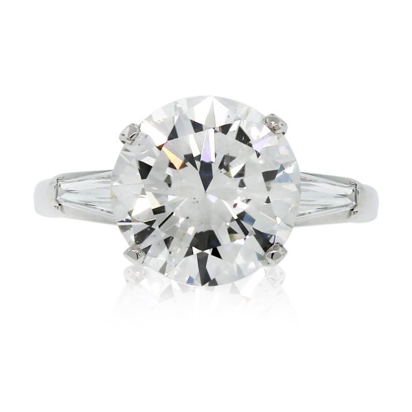 This Platinum EGL Certified Round Brilliant & Baguette Diamond Engagement Ring is stunning!