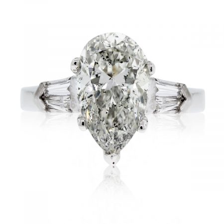 This Platinum 3.47ct Pear Shape & Baguette Diamond Engagement Ring is stunning!