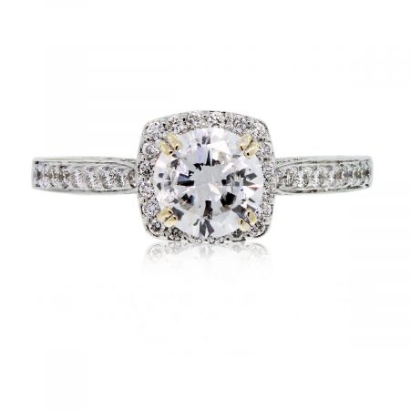 This Platinum Round Brilliant Diamond Halo Engagement Ring is stunning!