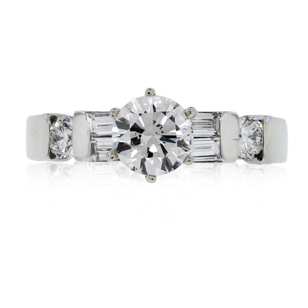 This Platinum EGL Cert. Round Brilliant/Baguette Diamond Engagement Ring is beautiful!