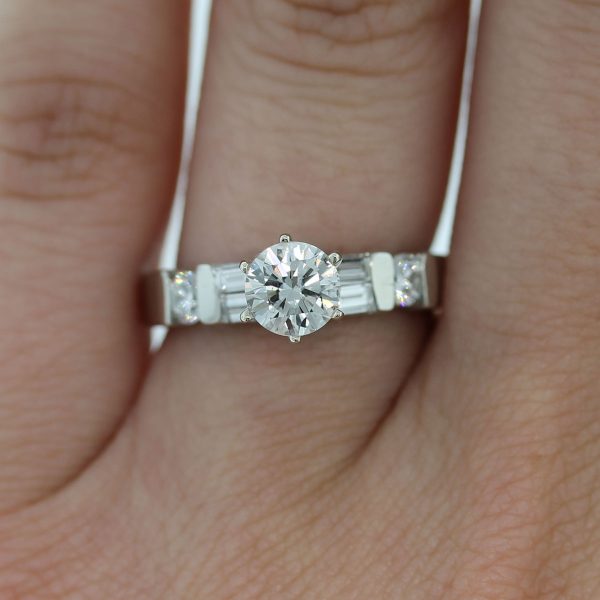 Have you seen this gorgeous Platinum EGL Cert. Round Brilliant/Baguette Diamond Engagement Ring!