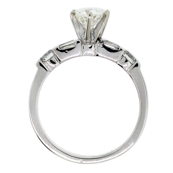 We love this Platinum EGL Cert. Round Brilliant/Baguette Diamond Engagement Ring