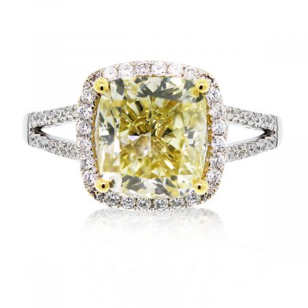 This split shank cushion cut fancy yellow diamond engagement ring is gorgeous!
