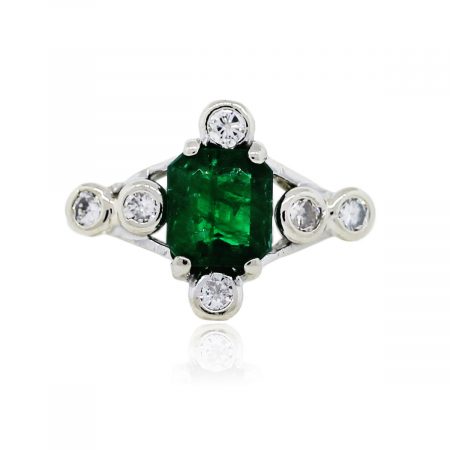 You are viewing this 14k White Gold Emerald and Diamond Ring!