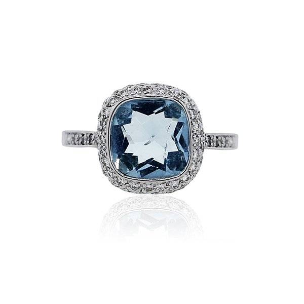 aquamarine cocktail ring with diamond halo