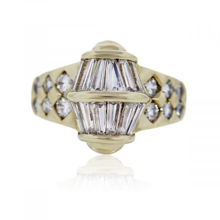 You are viewing this 18K Yellow Gold Baguette and Round Diamond Ring!