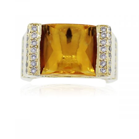 You are viewing this 18k Yellow Gold Radiant Citrine and Diamond Cocktail Ring!
