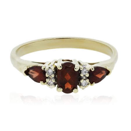 You are viewing this Yellow Gold Three Stone Garnet Diamond Ring!