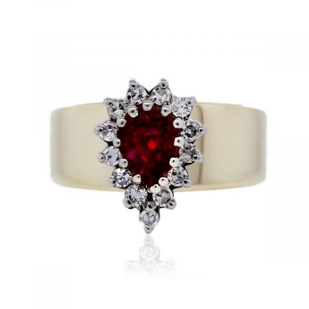 You are viewing this 14k Yellow Gold Diamond Ruby Pear Shape Ring!