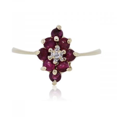 You are viewing this Yellow Gold Ruby and Diamond Cluster Cocktail Ring!
