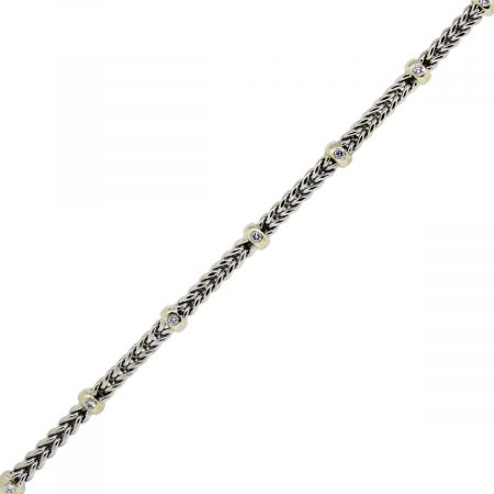 You are viewing this 14k Two Tone Diamond Accents Woven Bracelet!