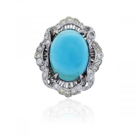 You are viewing this 18k White Gold Turquoise and Diamond Cocktail Ring!