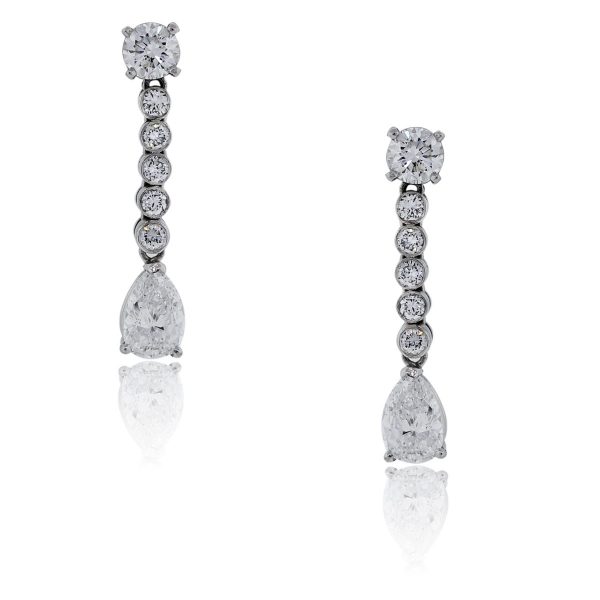 You are viewing these Platinum 4.69 Carats of Diamonds Drop Dangle Earrings!