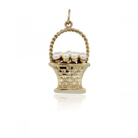You are viewing this 14K Yellow Gold Pearls In A Basket Pendant!