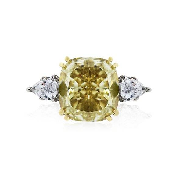 Fancy yellow cushion cut diamond engagement ring