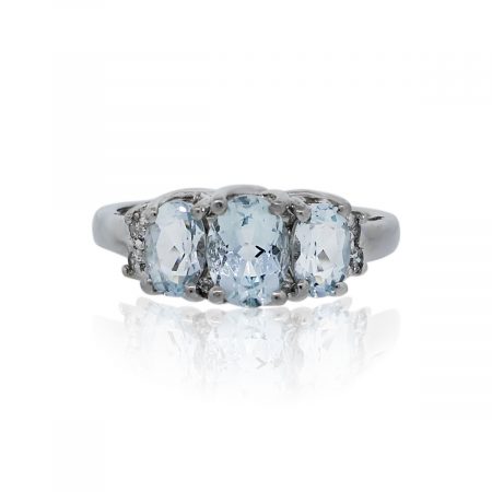 You are viewing this 14K White Gold Blue Oval Topaz Diamond Ring!