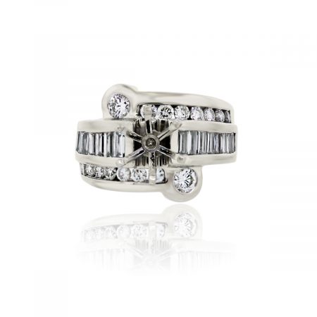 You are viewing this 18k White Gold Round Brilliant Cut Baguette Diamond Mounting!
