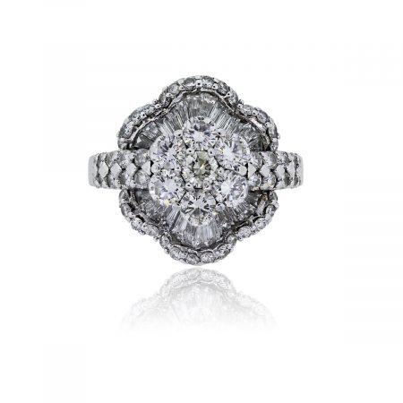 You are viewing this 18k White Gold Round Brilliant Baguette Diamond Flower Ring!