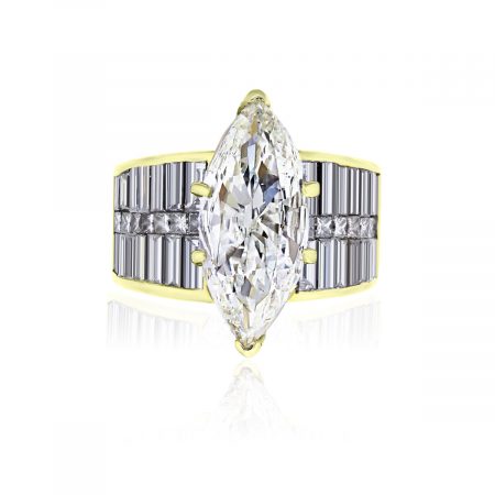 You are viewing this 18k Yellow Gold 4.61ct Marquise and Baguettes Diamond Ring!
