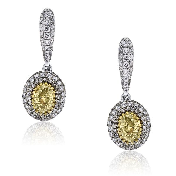You are viewing these 18k Two Tone Oval Brilliant 1.12ct Fancy Yellow EGL Cert. Earrings!