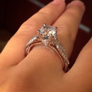 White gold and rose gold diamond solitaire with twisted sides