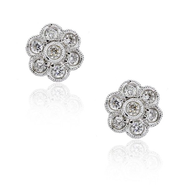 You are viewing this 18K White Gold .28ctw Diamond Flower Stud Earrings!