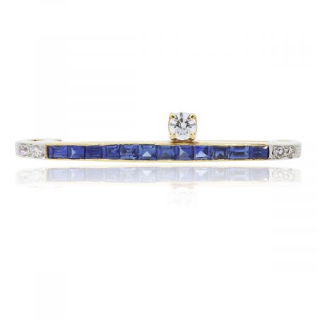 You are viewing this 14k Yellow Gold Blue Sapphire and Diamond Bar Pin!