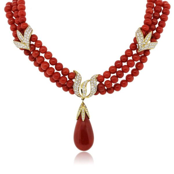 You are viewing this 18k Yellow Gold Diamond Triple Strand Coral Necklace!