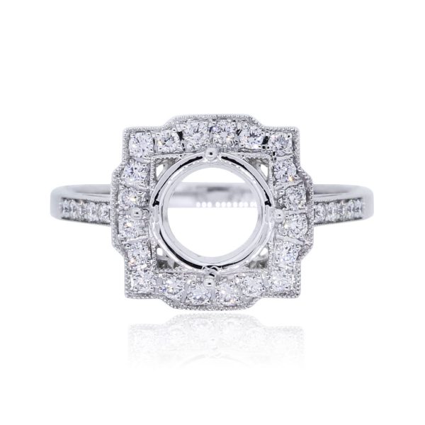 You are viewing this Platinum .37ctw Diamond Halo Mounting!