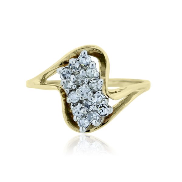 You are viewing this 14k Yellow Gold .50ctw Diamond Cluster Ring!