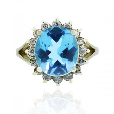 You are viewing this 14k Yellow Gold Blue Topaz 0.32ctw Diamond Cocktail Ring
