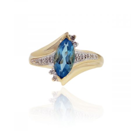 You are viewing this 10k Yellow Gold Marquise Blue Topaz Diamond Ring!