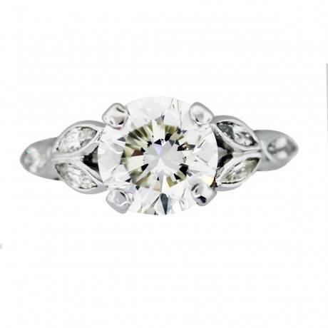 Vintage floral engagement ring with 3 carat center diamond