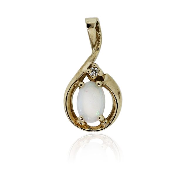 You are viewing this 14k Yellow Gold Opal & .02ctw Diamond Pendant