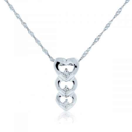 You are viewing this 10K White Gold .10ctw Diamond Triple Heart Pendant
