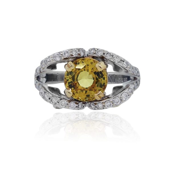 You are viewing this 18k White Gold Yellow Sapphire .60ctw Diamond Ring!