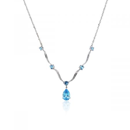 You are viewing this 14k White Gold Blue Topaz and Diamond "V" Necklace!