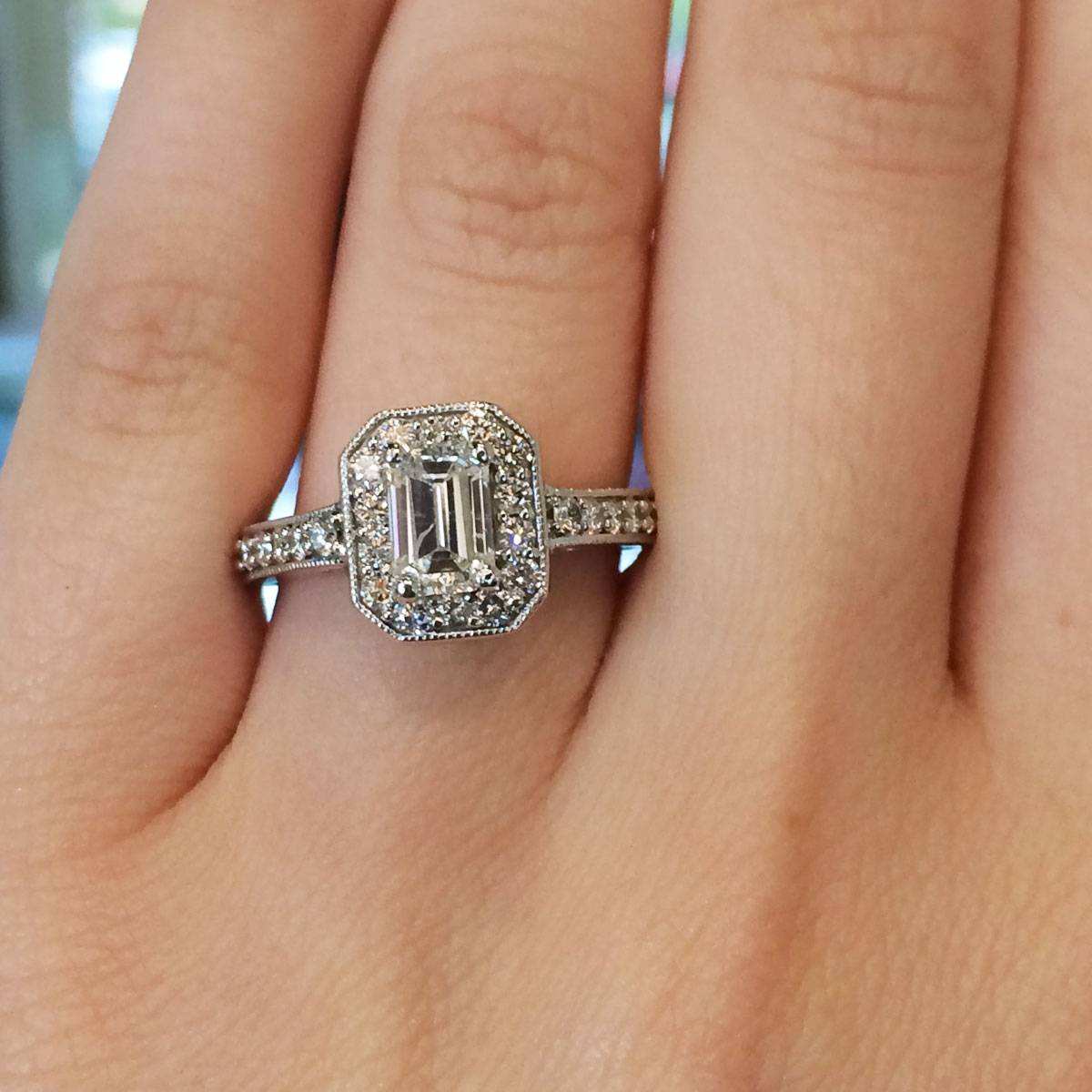 White gold emerald cut halo engagement ring
