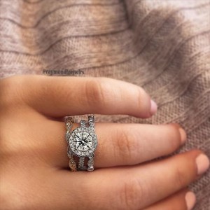 Halo engagement ring with two wedding rings