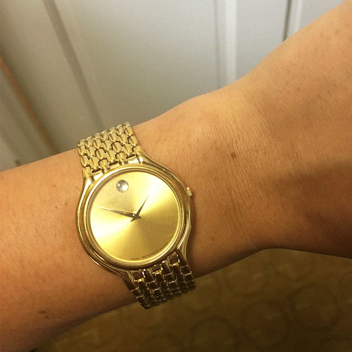 movado museum watch gold