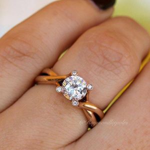 Rose gold twisted solitaire engagement ring