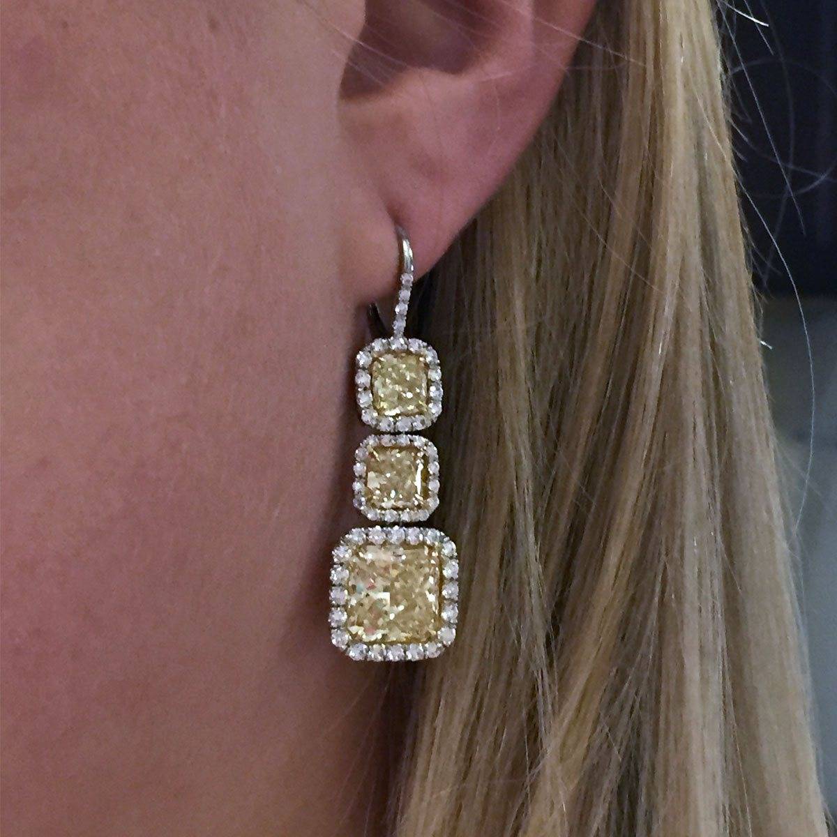 15 carat fancy yellow diamond earrings