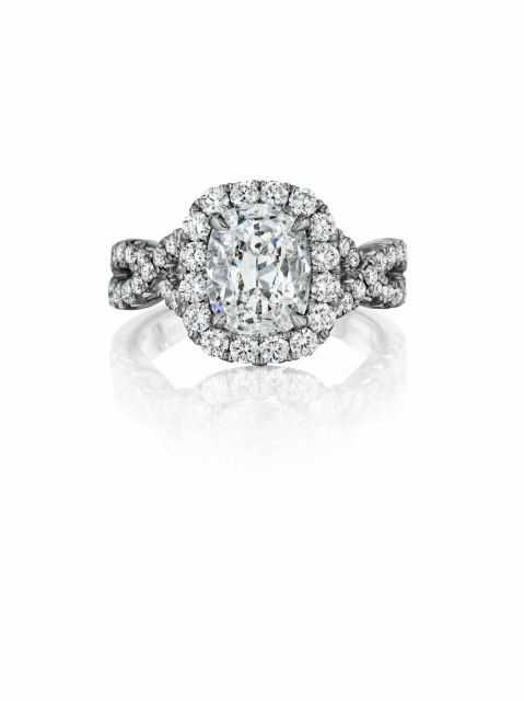 Henri Daussi cushion cut engagement ring with infinity band