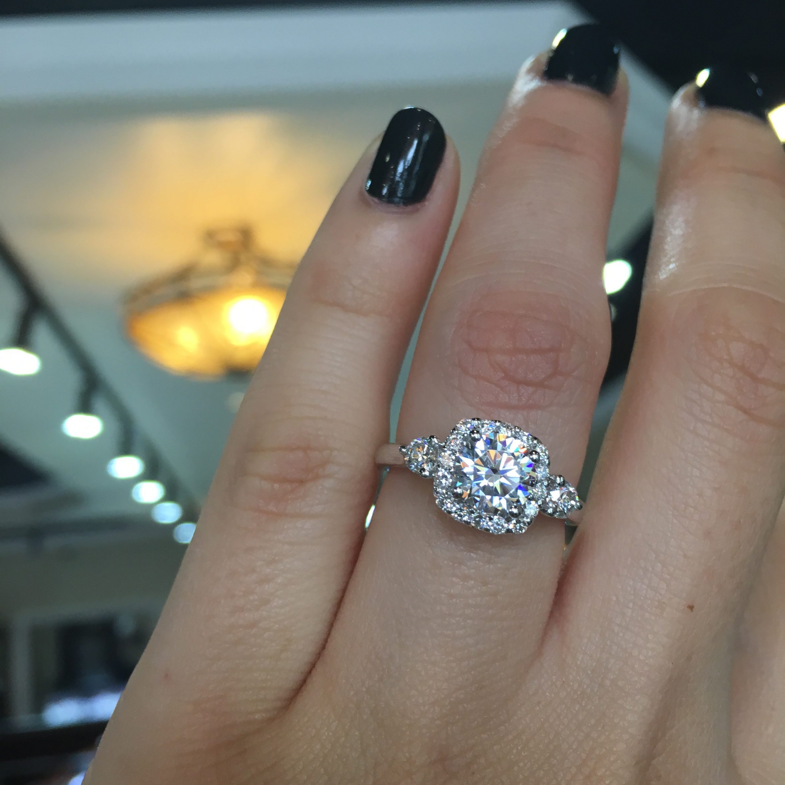 A stunning cushion halo enagement ring under $4000