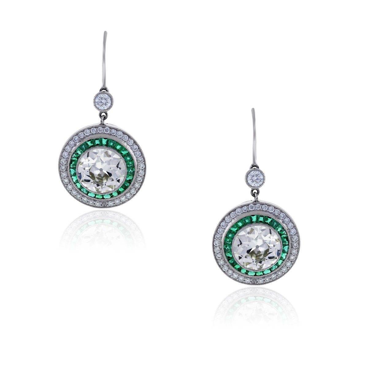 Emerald and diamond halo earrings