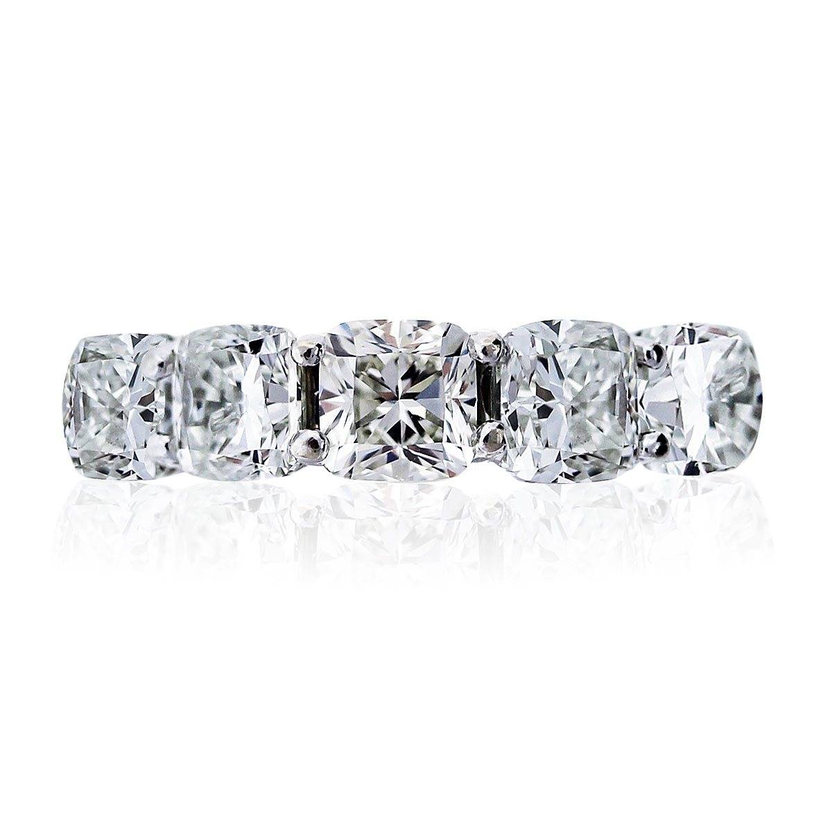 Eternity bands are our most popular wedding band choice, and cushion cut diamonds are in the top 2 of diamond shapes. Put them both together and magic happens.