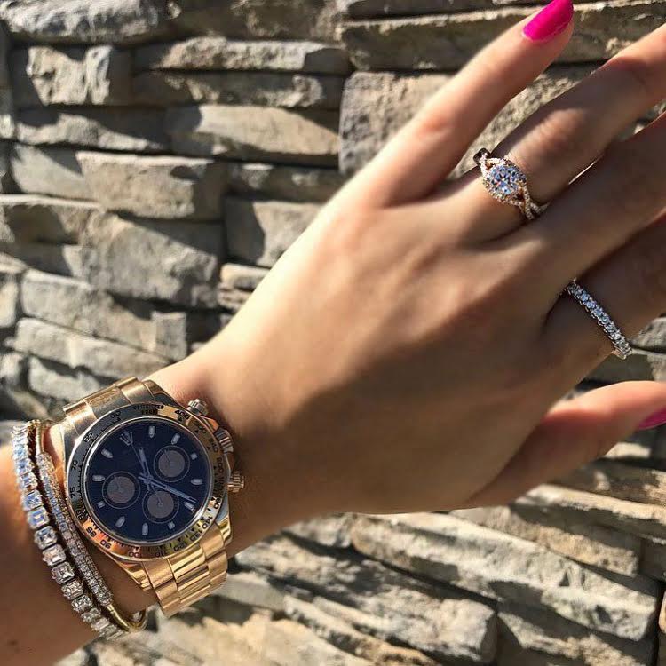 girl with jewelry and rose rolex daytona