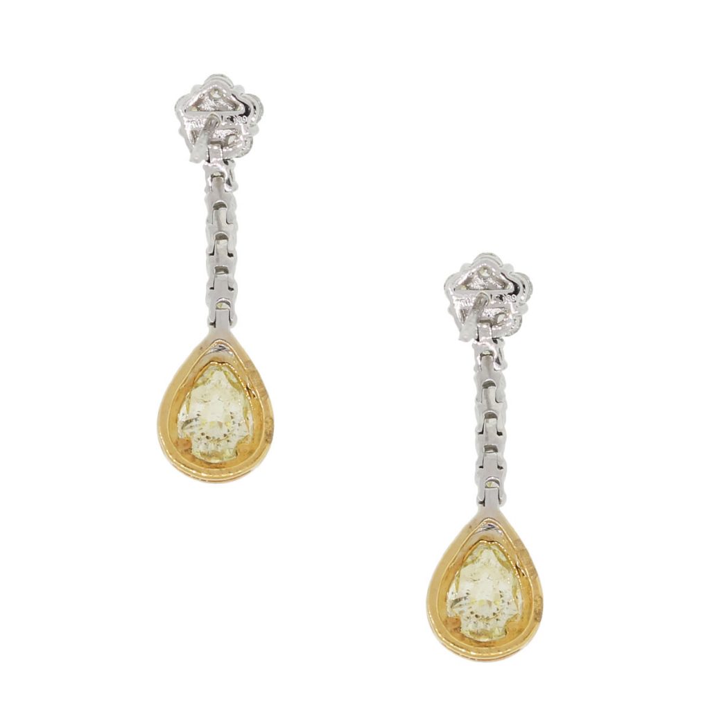 fancy yellow pear shape diamond earrings