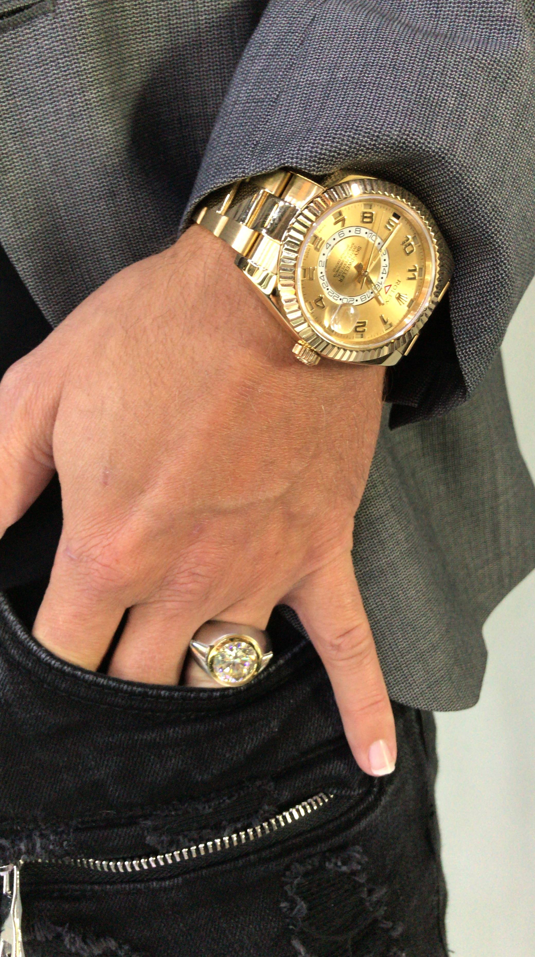 10 carat round diamond in platinum and 18kt yellow gold and 18kt yellow Gold Rolex Skydweller 