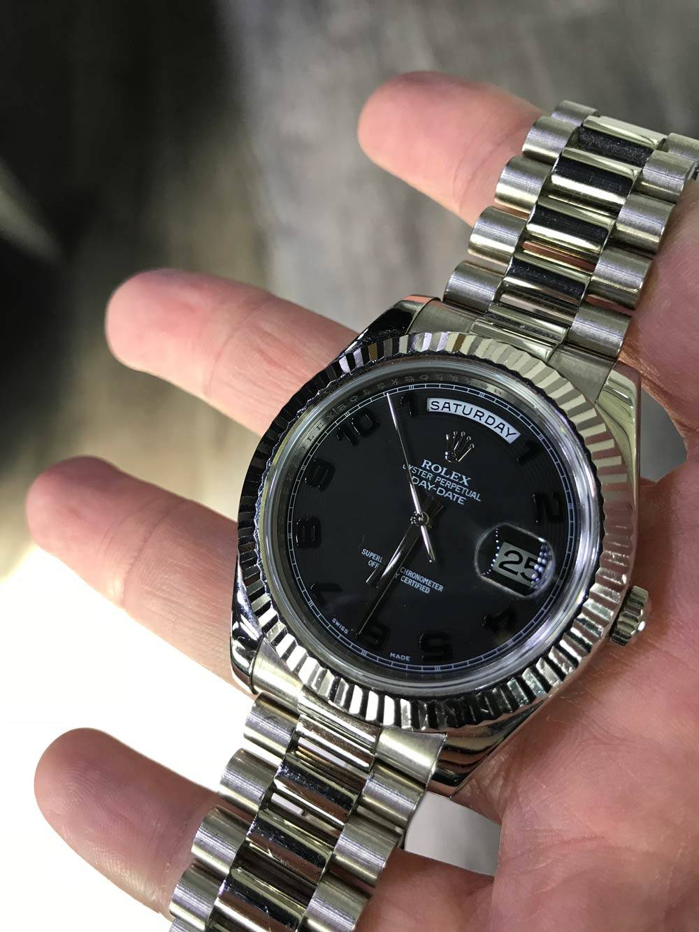 rolex day date white gold black dial